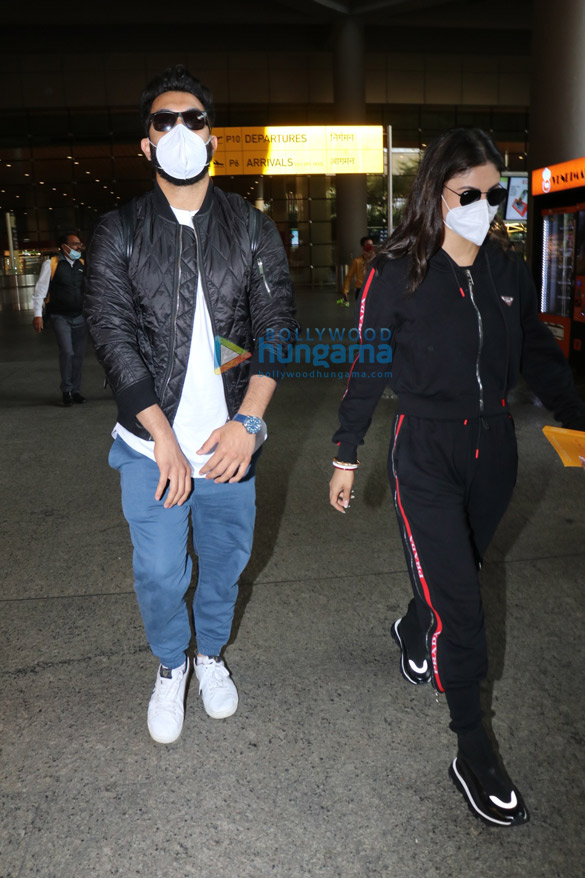 photos mouni roy and her husband spotted at the airport 2