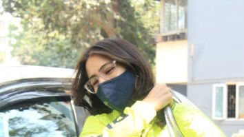 Photos: Sara Ali Khan pairs a neon green Puma jacket and black pants as she gets snapped in Juhu
