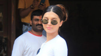 Photos: Tara Sutaria snapped in a white top and denim hot pants outside a dubbing studio in Andheri