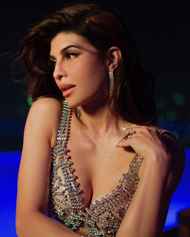 Jacqueline Fernandez strikes a glamorous pose in a crystal bralette and metallic skirt