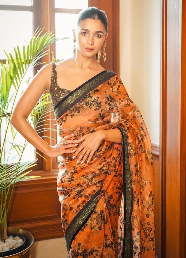 Alia Bhatt is all about elegance in Sabyasachi Mukherjee's peach organza saree as she promotes RRR in Delhi with SS Rajamouli, Ram Charan and Jr. NT