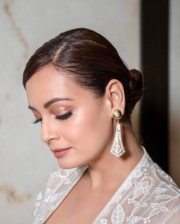 Dia Mirza looks serene in white Anita Dongre ensemble worth Rs. 99,000 paired with vintage pearl earrings worth Rs. 25,000