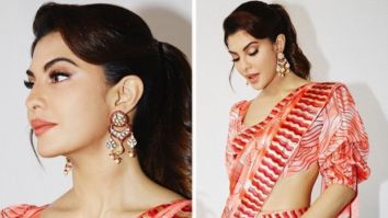 Jacqueline Fernandez looks elegant during Bachchhan Paandey promotions in breathtaking orange printed contemporary saree and backless blouse