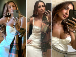 Malaika Arora is vision in pearl white strappy corset style thigh-high slit dress