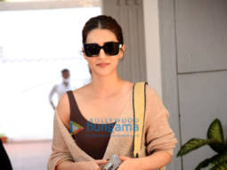 Photos: Kriti Sanon steps out to meet producer Anand Pandit at his office