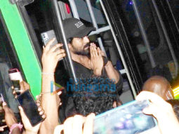 Photos: Ram Charan greets fans as he arrives to watch the early morning show of RRR in Hyderabad