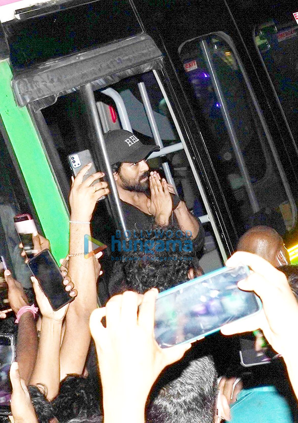 photos ram charan greets fans as he arrives to watch the early morning show of rrr in hyderabad 1