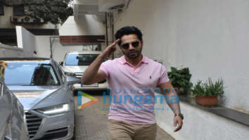 Photos: Varun Dhawan spotted outside Dharma Productions’ office in a pink T-shirt and khakhee pants