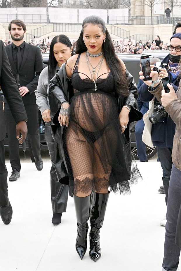 Rihanna makes statement for pregnancy fashion; goes from criss-cross halter neck top and shimmery skirt to semi-sheer black ensemble flaunting her baby bump