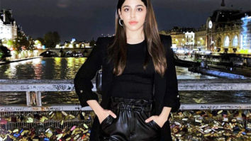 Alaya F shines in an all-black outfit as she poses at Paris’ Pont des Arts bridge