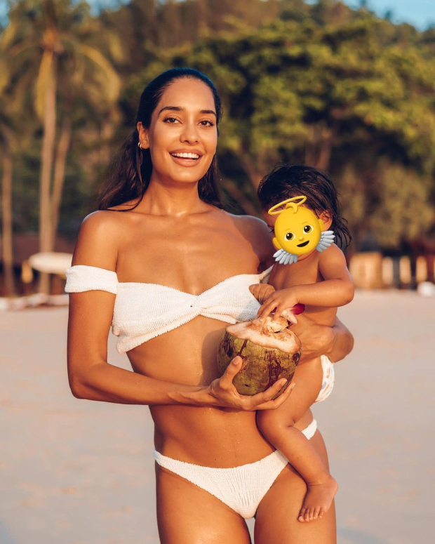 Lisa Haydon poses in a white bikini as she shares glimpses from her day out at the beach with her daughter