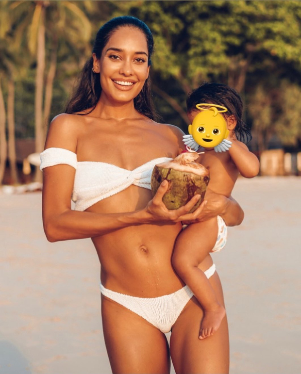 Lisa Haydon poses in a white bikini as she shares glimpses from her day out at the beach with her daughter