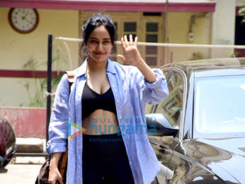 Photos: Neha Sharma waves at the paparazzi as she gets spotted after her gym workout