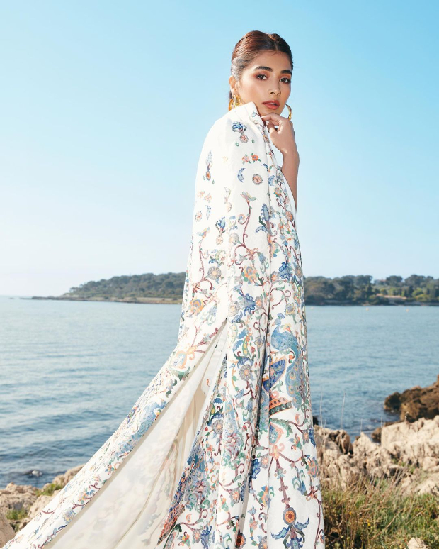 Cannes 2022: Pooja Hegde is epitome of grace and panache in floral printed jacquard strapless dress and long cape worth over Rs. 2 lakh  Cannes 2022: Pooja Hegde is epitome of grace and panache in floral printed jacquard strapless dress and long cape worth over Rs. 2 lakh