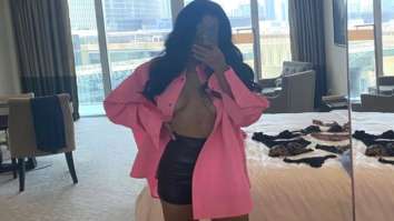 Esha Gupta sets the temperature soaring in pink unbuttoned shirt and black shorts in bold photo