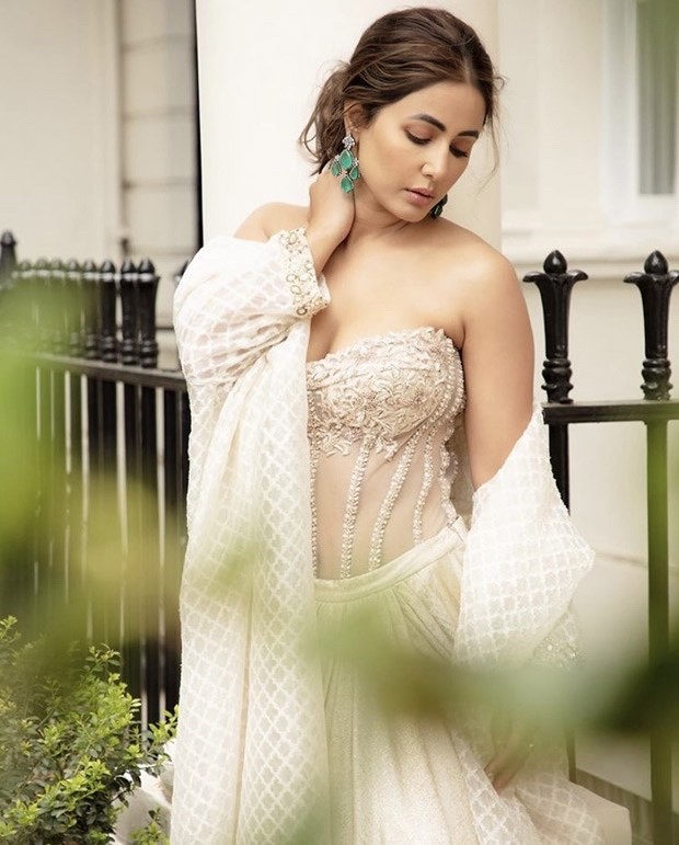 Hina Khan sets hearts racing in white sheer off-shoulder corset paired with draped skirt and embellished jacket worth Rs.1.5 lakh for the UK Asian Film Festival Hina Khan sets hearts racing in white sheer off-shoulder corset paired with draped skirt and embellished jacket worth Rs.1.5 lakh for the UK Asian Film Festival