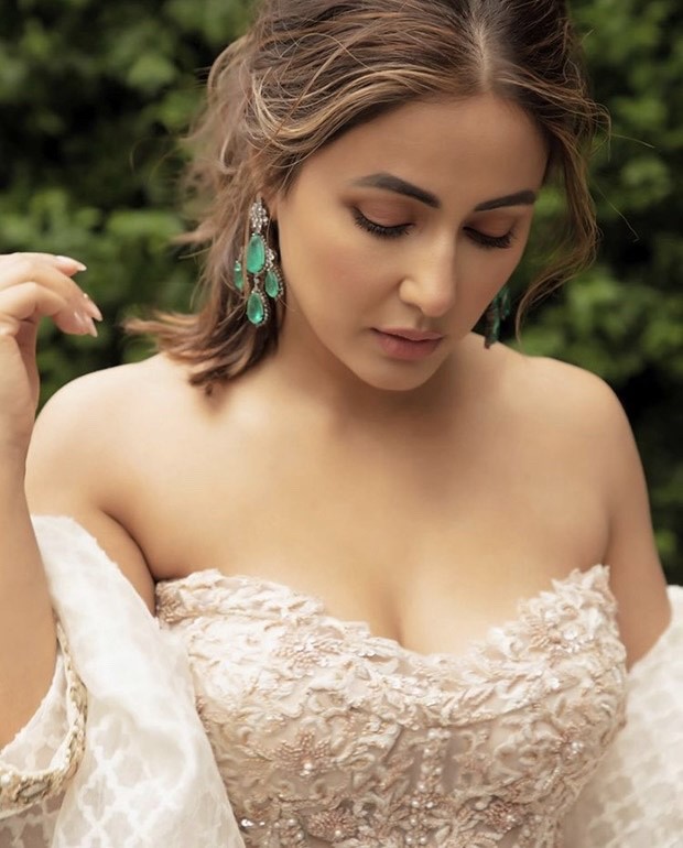 Hina Khan sets hearts racing in white sheer off-shoulder corset paired with draped skirt and embellished jacket worth Rs.1.5 lakh for the UK Asian Film Festival Hina Khan sets hearts racing in white sheer off-shoulder corset paired with draped skirt and embellished jacket worth Rs.1.5 lakh for the UK Asian Film Festival