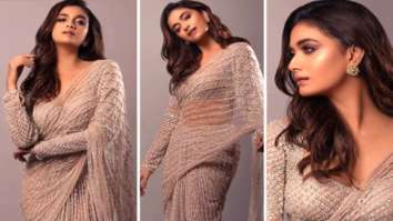 Pregnant Sonam Kapoor dons six yards of elegance flaunting her