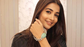Pooja Hegde poses on the sets of Kabhi Eid Kabhi Diwali wearing a bracelet similar to that of co-star Salman Khan