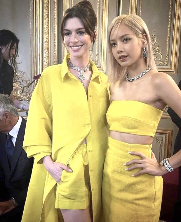 Anne Hathaway and BLACKPINK’s Lisa twin in yellow at Bvlgari event