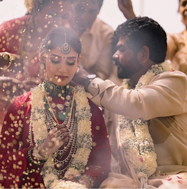 Nayanthara-Vignesh Shivan wedding: Bride looks opulent in vermillion red custom saree with Goddess Lakshmi motifs; Groom dons traditional veshti