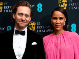 Tom Hiddleston and fiancée Zawe Ashton expecting their first child; actress debuts baby bump at Mr. Malcolm’s List premiere