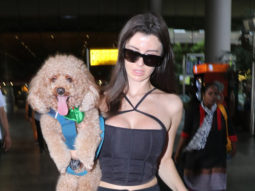 Giorgia Andriani spotted at the airport playing with a dog