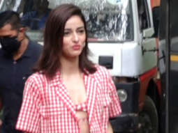 Ananya Panday poses for paps in matching red chequered outfit
