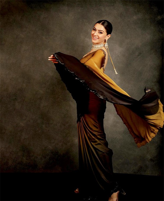 Hansika Motwani exudes royalty in stunning mustard black ombre saree worth Rs. 71,000 as she attends the audio launch of her film Maha