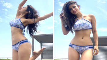 Mouni Roy looks smoking hot as she flaunts an incredibly toned physique in a white and blue printed bikini