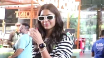 Mrunal Thakur poses for paps at the airport