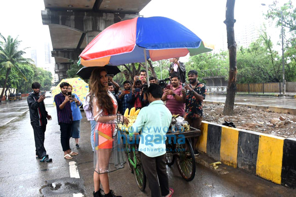 photos poonam pandey snapped enjoying corn in the rains 6