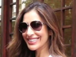 Sophie Choudry poses for paps with her dog