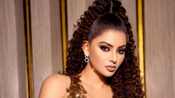 Urvashi Rautela looks stunning in the golden metallic gown