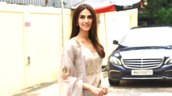 Vaani Kapoor smiles while posing at paps