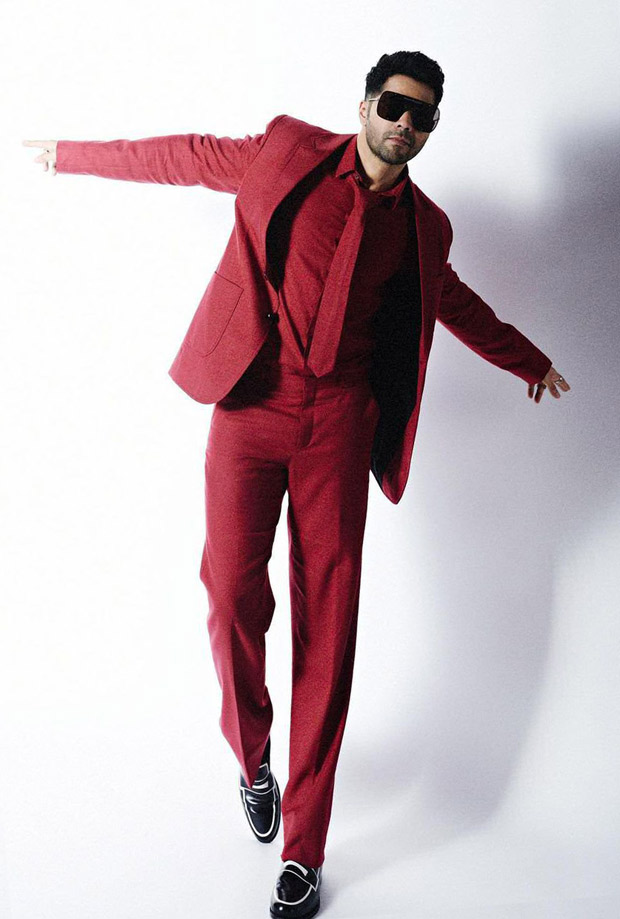 Varun Dhawan looks suave in red coloured suit for Koffee with Karan season 7