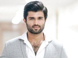 Vijay Deverakonda waves at paps