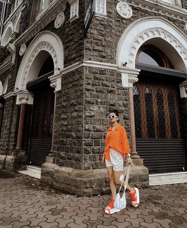 Avneet Kaur takes over streets of Mumbai in chic oversized orange shirt and white shorts