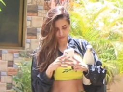 Malaika Arora poses for a selfie with little fan