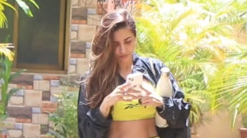 Malaika Arora poses for a selfie with little fan