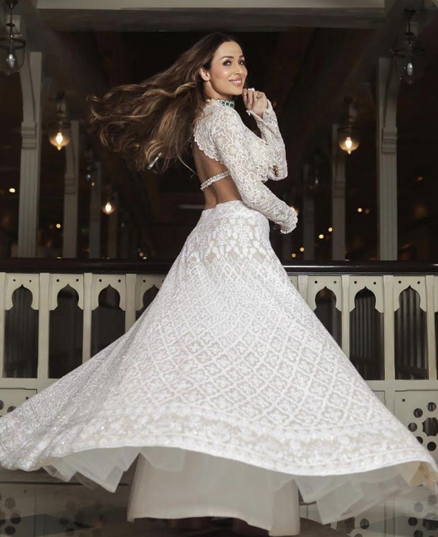 Malaika Arora’s pristine white lehenga from Kunal Rawal's pre-wedding bash is all things perfect 
