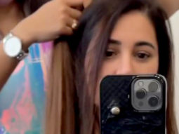 Nargis Fakhri can’t decide what color hair extensions to choose!