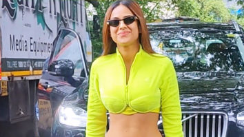 Nia Sharma poses for paps in neon sports wear