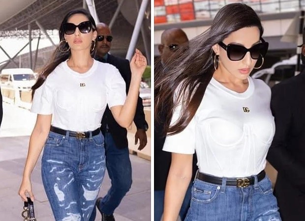 Nora Fatehi puts forth a stylish look in white Ps. We love her Chanel bag  and how she transformed her shirt into a cropped one!…