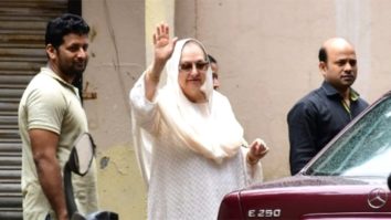 Saira Banu waves at paps in white salwaar
