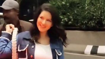 Sunny Leone flashes her cute smile while posing for paps