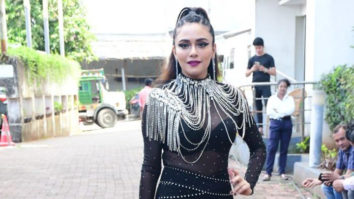 Amruta Khanvilkar poses in a black bold outfit