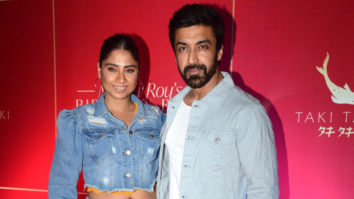 Ashish Chaudhry poses along with wife at Mouni Roy’s party