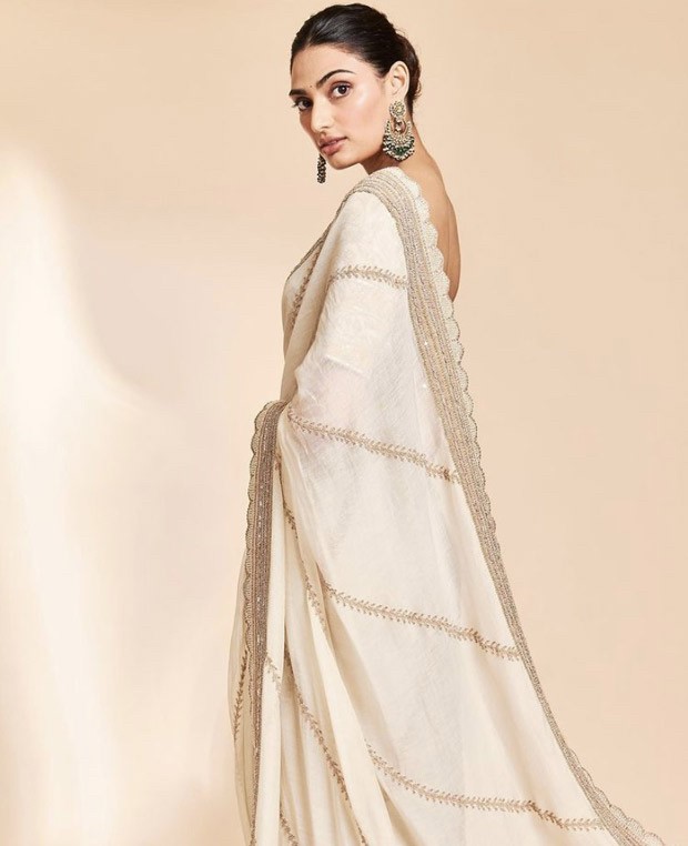 Athiya Shetty goes all traditional in an ivory and golden saree by Anamika Khanna in latest photo-shoot