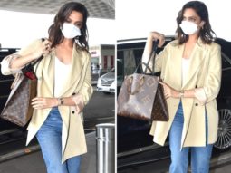 Deepika Padukone teams her beige coat and baggy pants with a Louis Vuitton bag worth Rs. 2 Lakhs as she gets clicked at the airport